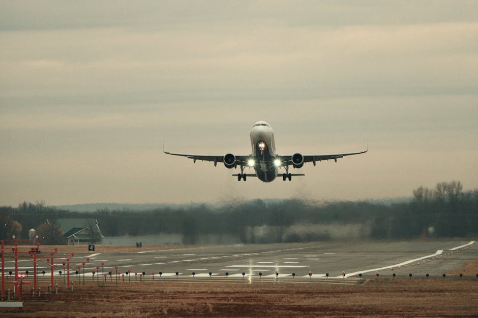 Airplane taking off from runway captured in Connecticut, showcasing aviation and travel themes.