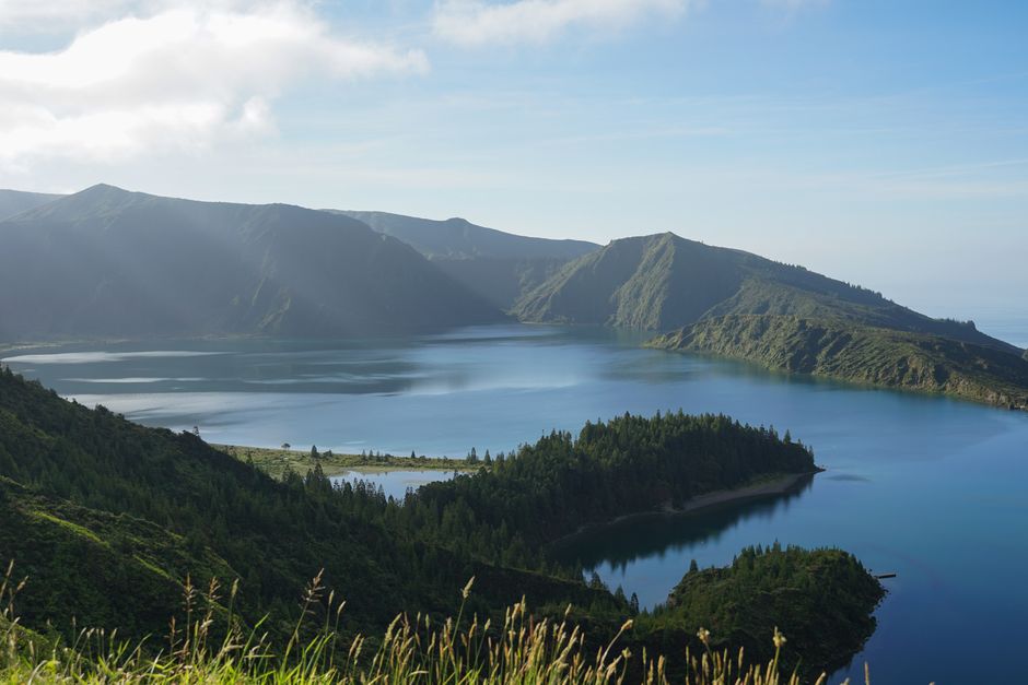Beautiful view of Lagoa do Fogo with lush green surroundings in São Miguel, Azores, Portugal.