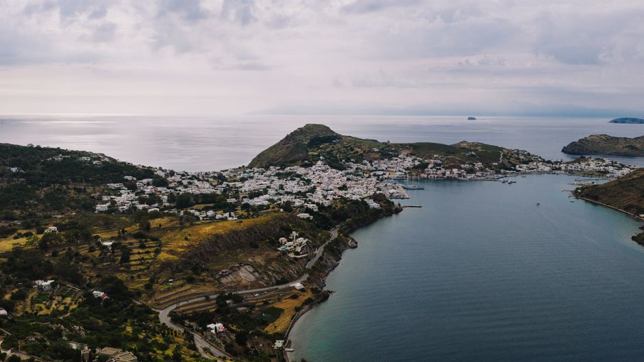 Breathtaking aerial view of Patmos Island, Greece, showcasing its coastal beauty and charming architecture.