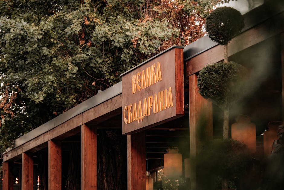 Moody exterior of a traditional restaurant in autumn with colorful foliage.